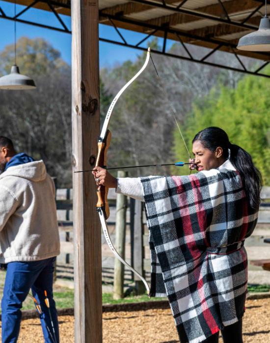 woman with bow and arrow