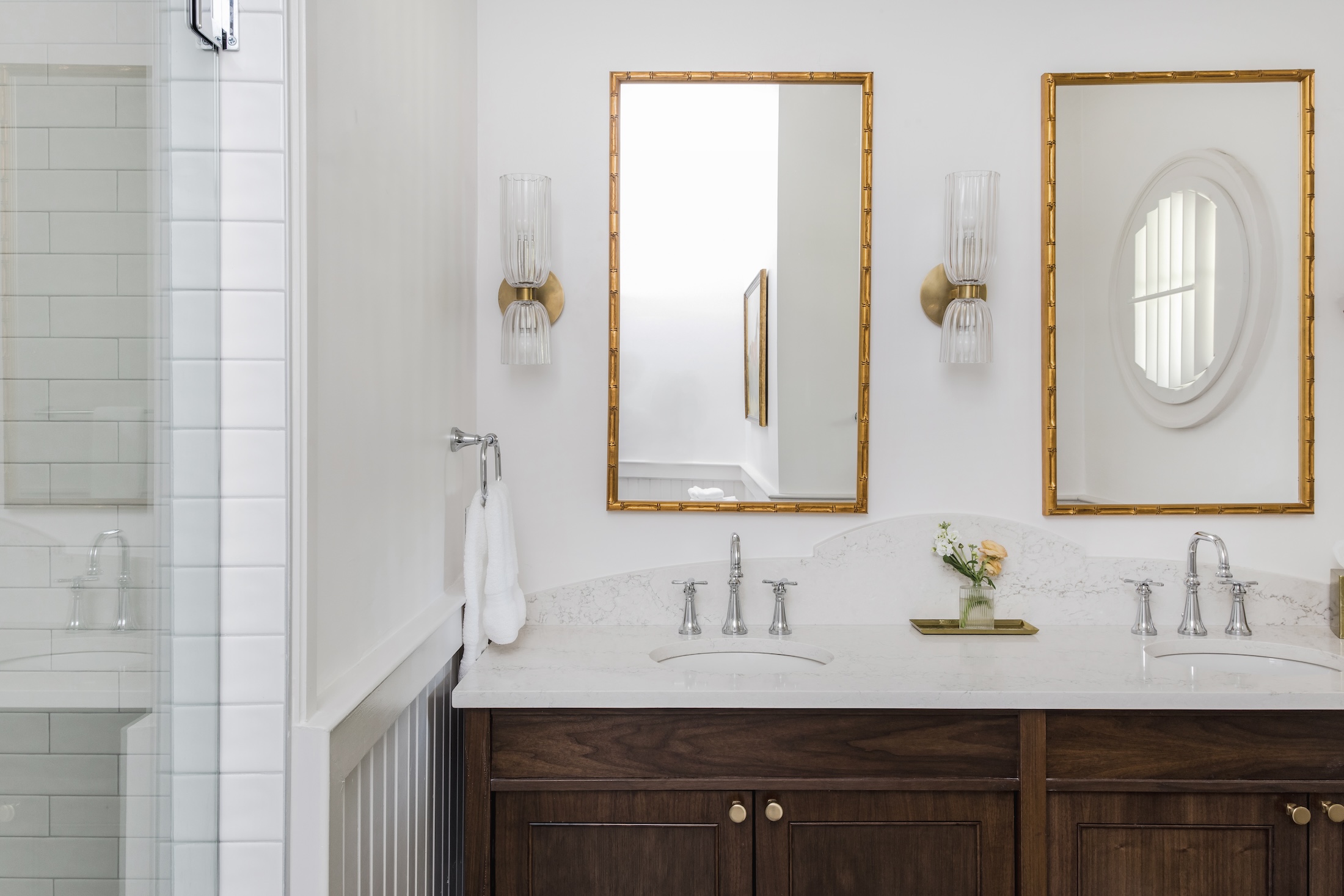 Two sinks and mirrors in the bathroom of Cottage Suites at Barnsley Resort.