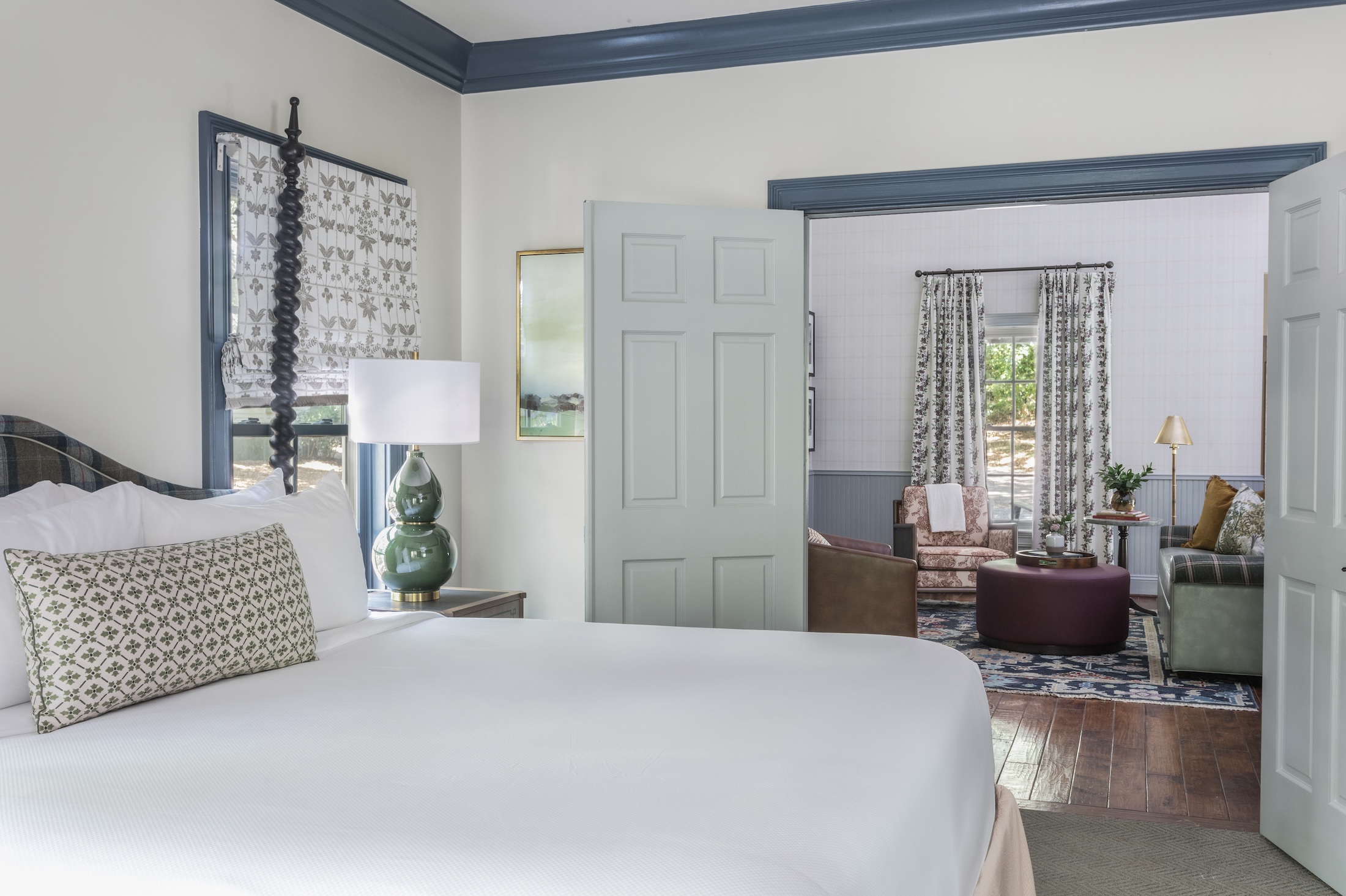 A king bedroom off of the living area in the Julia Cottage at Barnsley Resort.