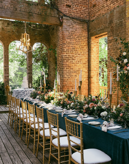 Barnsley Resort Wedding, long decorated table with florals and candles