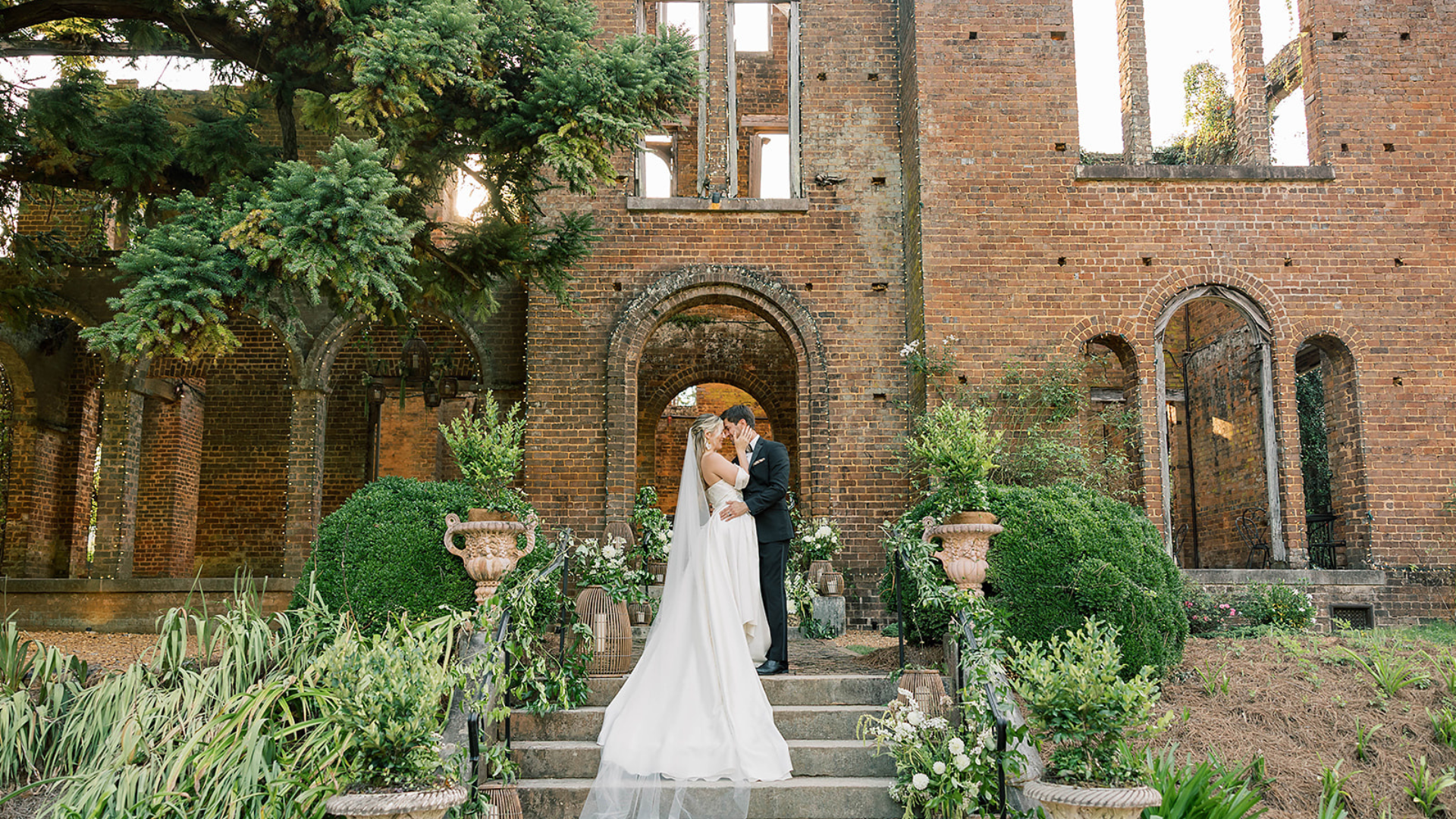 wedding, couple standing in front of Manor House Ruins