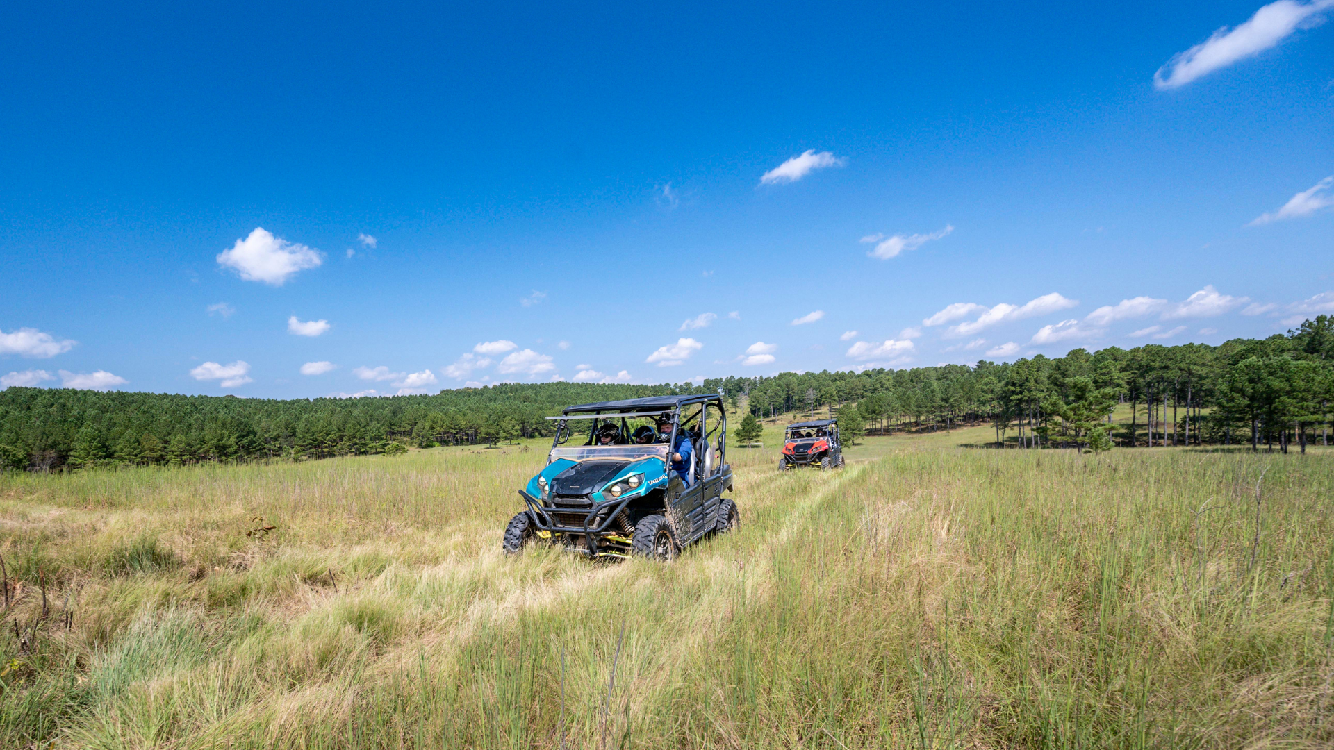UTV rides in field