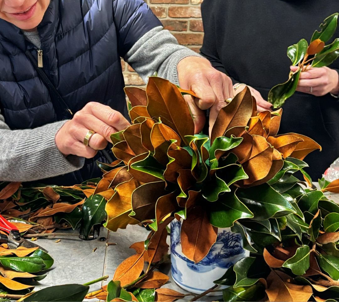 woman making a topiary with leaves