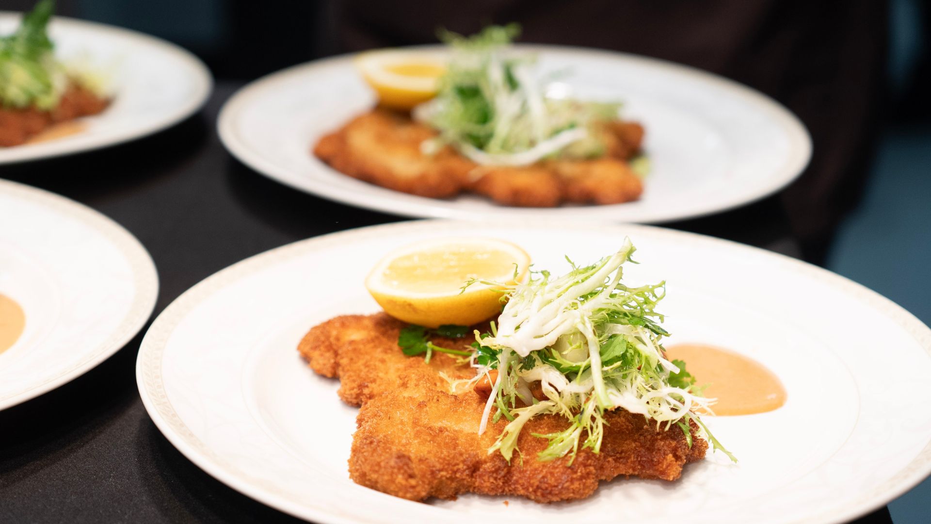 plated dish of pork schnitzel