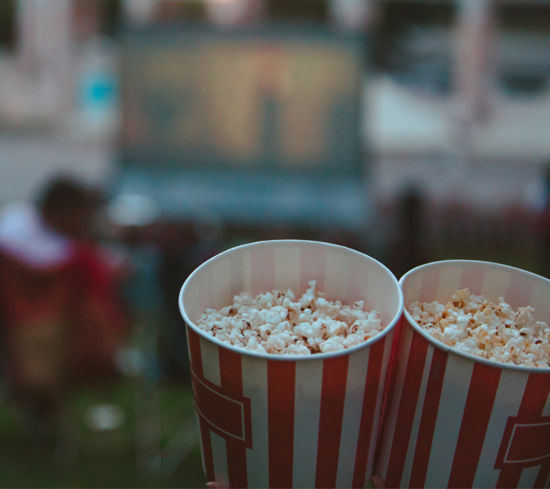 close up of two bags of popcorn outdoors