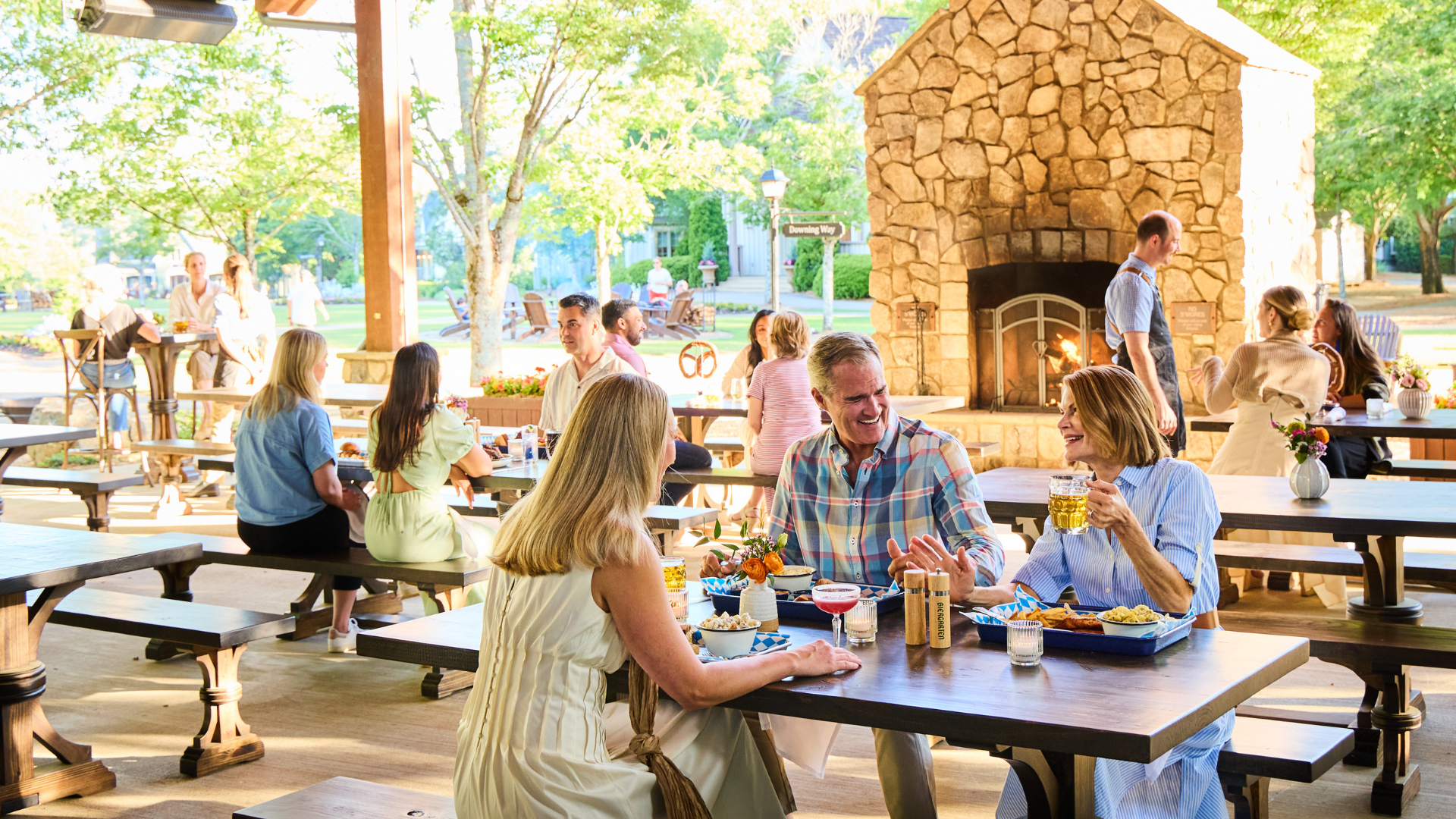 group of people eating in an open-air restaurant