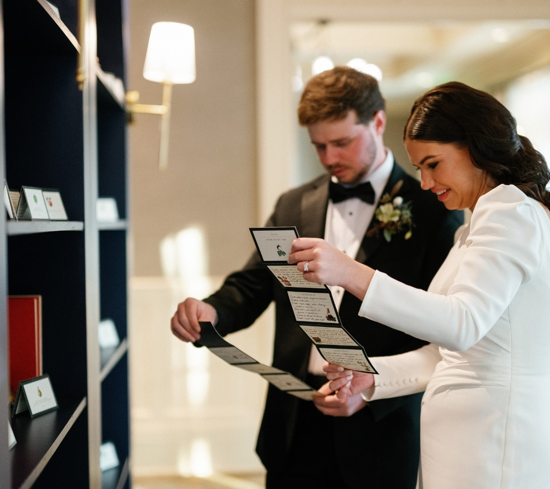 people looking at wedding decor and set up