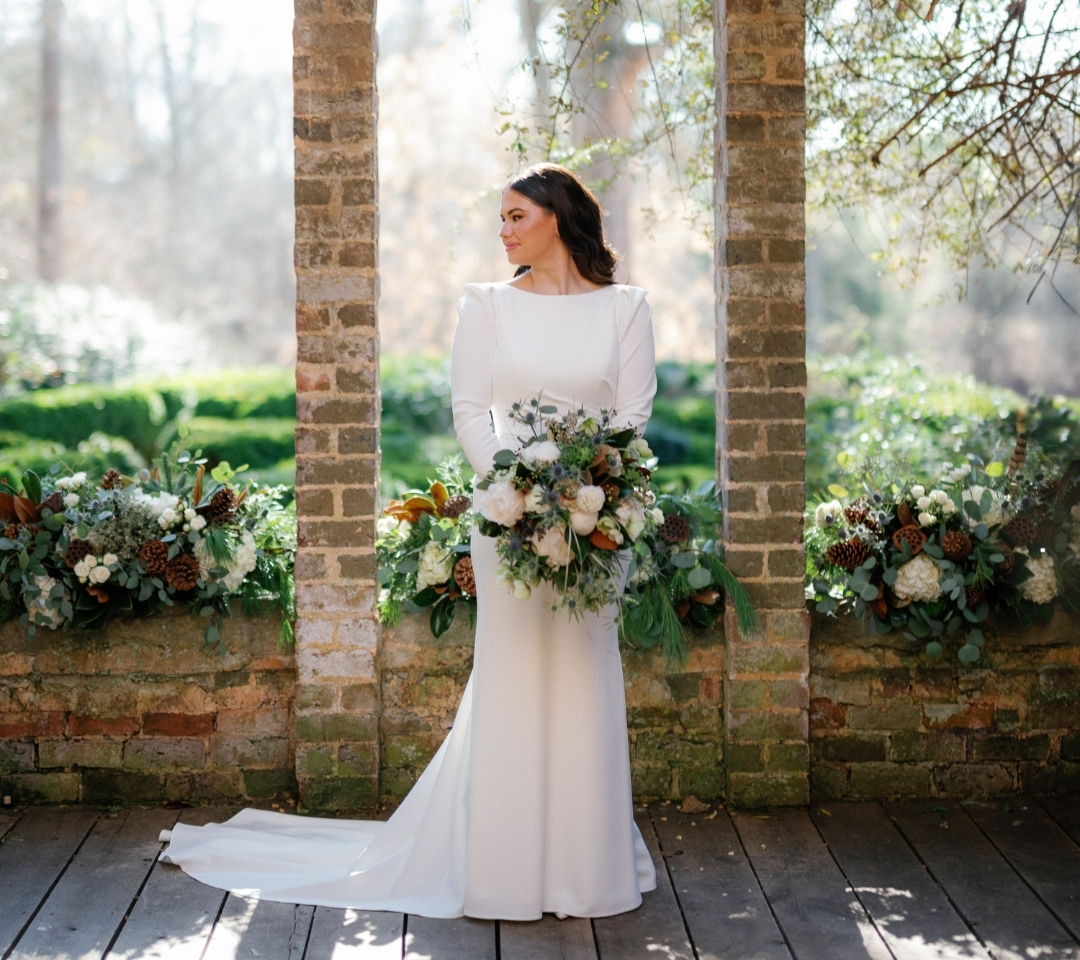 woman holding flower and wedding decor and set up