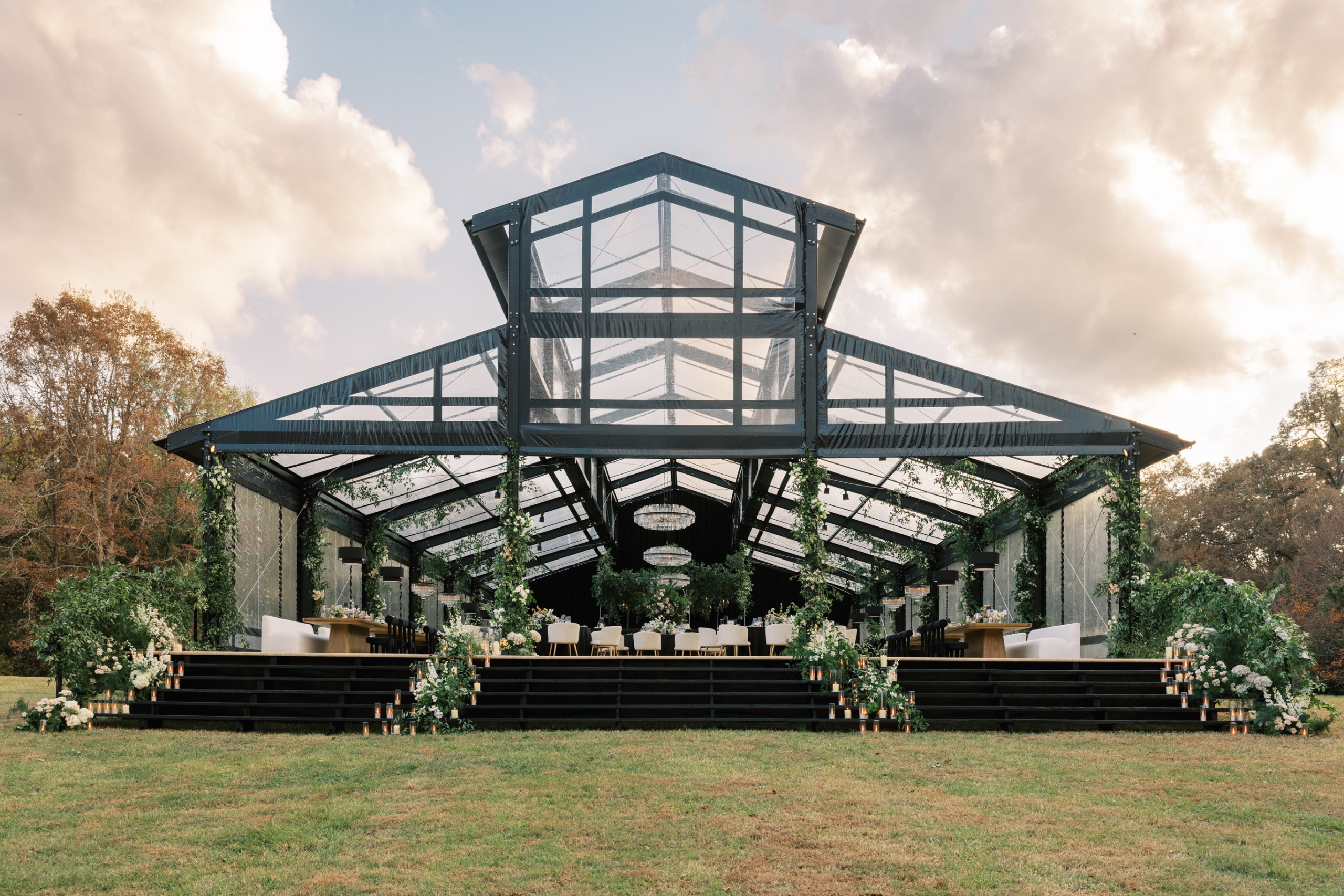 a black glass tent with florals
