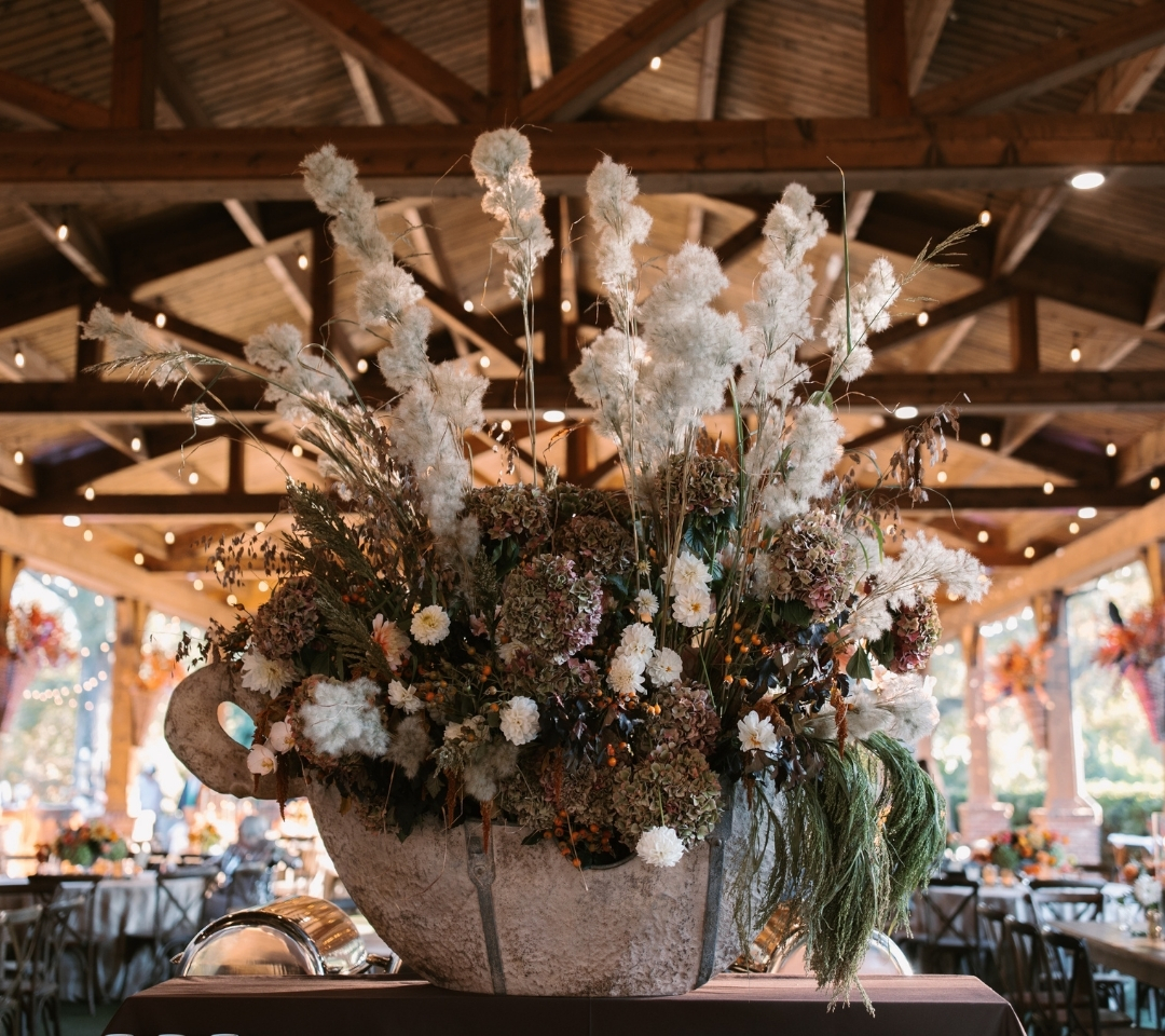 a floral centerpiece of pampas grass